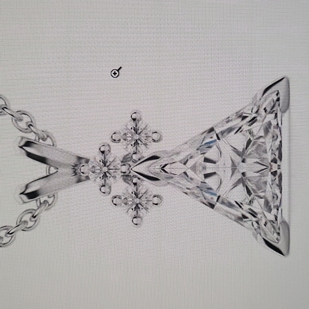 1.20ct lab diamond pendant set in white gold. Trillion cut center stone.